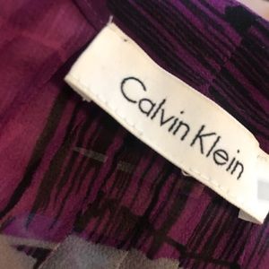 Calvin Klein. Large. Sheer short sleeve.
